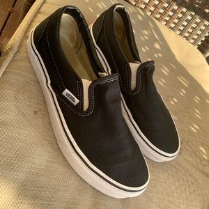 Women’s black slip on Van sneakers